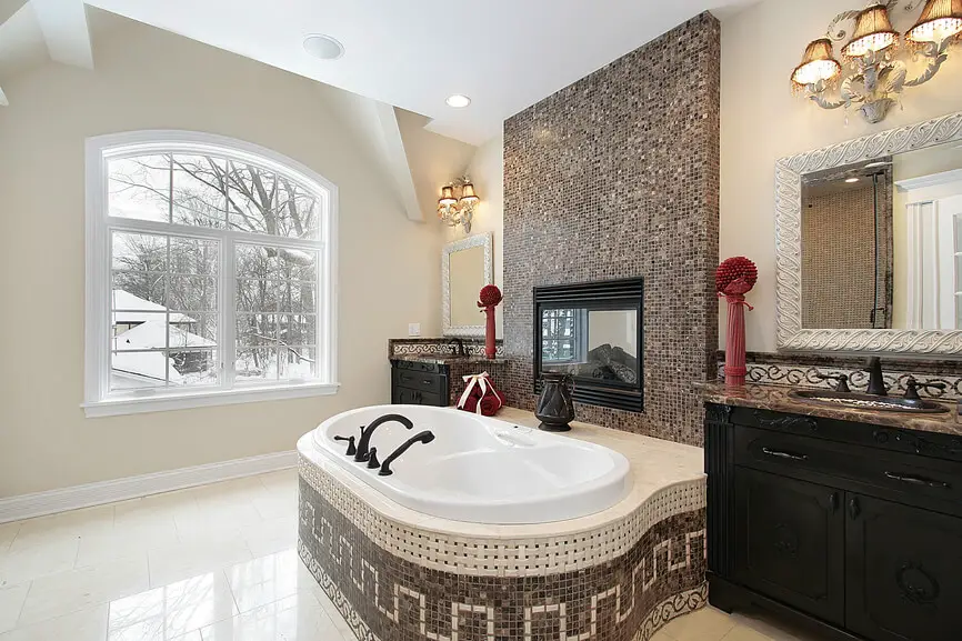 Master Bath in New Construction Home with Marble Tile Tub