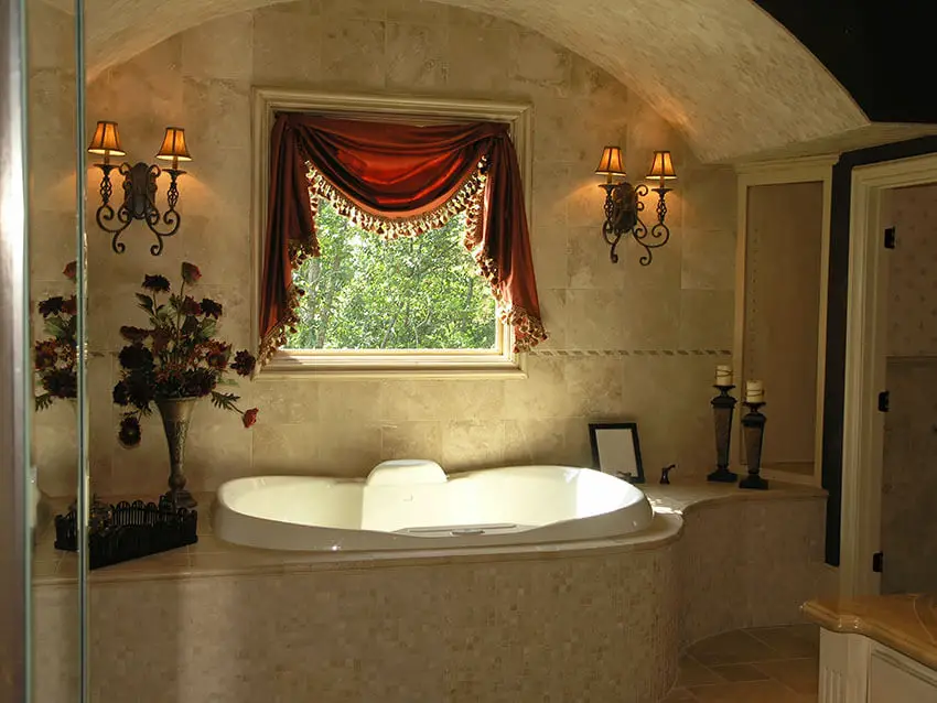 bathroom suite with relaxing bathtub