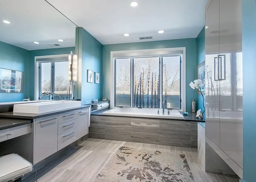 contemporary master bathroom with slate flooring and enclosure