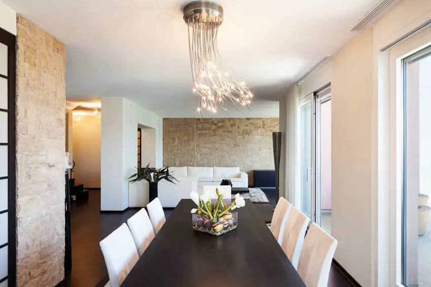 dining room with modern pendant bundle light fixture