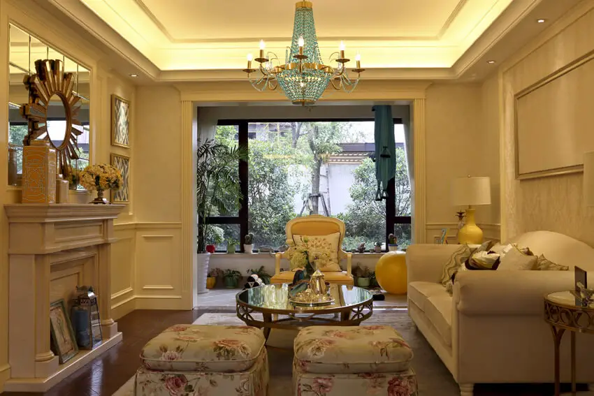 Formal Living Room With Large Tray Ceiling And Chandelier