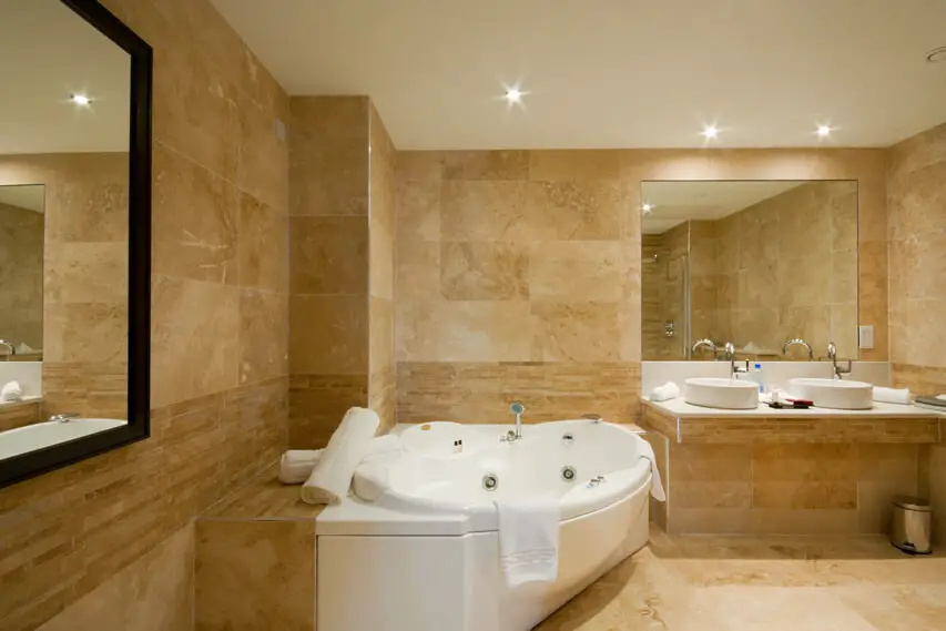 Luxury bathroom dual pedestal sinks jacuzzi tub