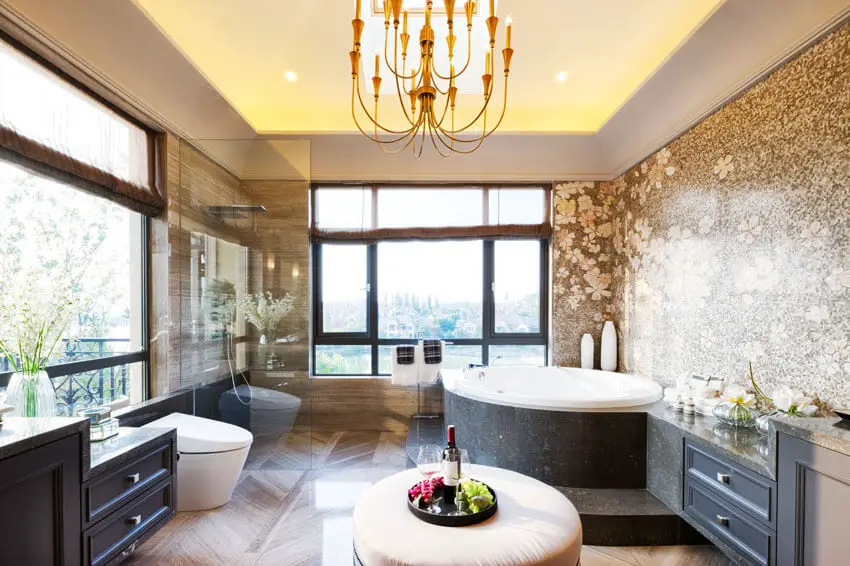 Modern bathroom with views and chandelier