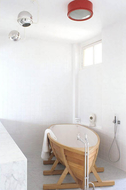 Original bathroom design with boat shaped tub
