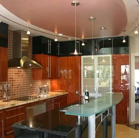 Modern small kitchen design with glass island
