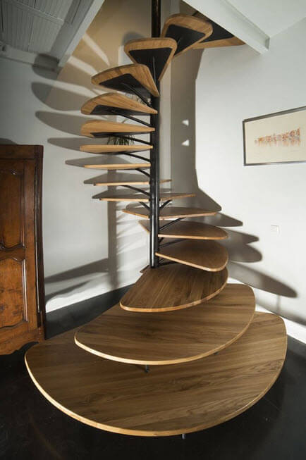 spiral staircase with rungs in the shape of leaves