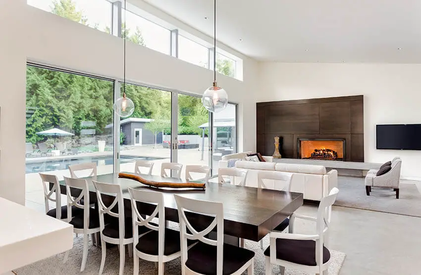 contemporary dining room with glass globe lighting and natural light