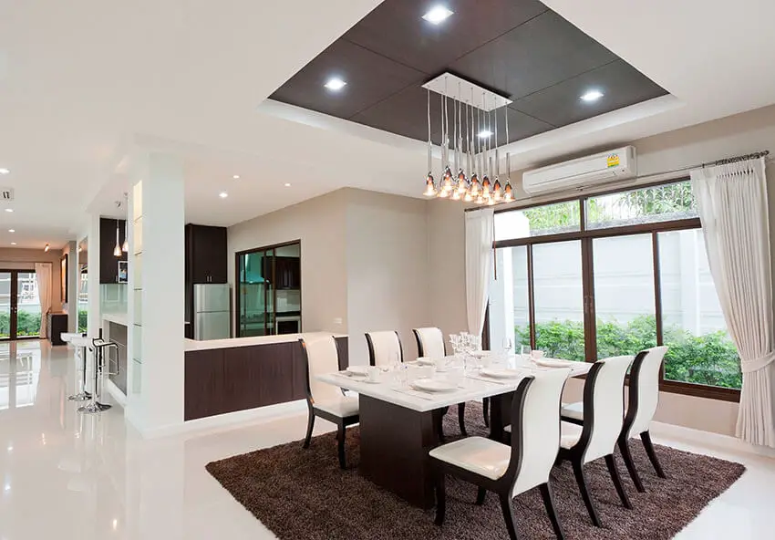 contemporary dining room with rectangular pendant cluster lighting